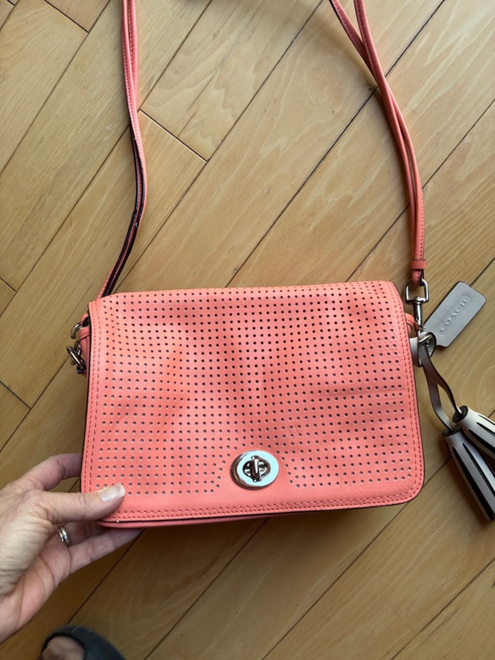 Coach perforated leather penny bag